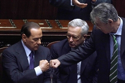 Il Presidente del Consiglio Silvio Berlusconi, il ministro dell'Economia Giulio Tremonti e il leader della Lega Umberto Bossi.