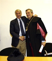 Don Virginio Colmegna complimentato dal nuovo sindaco di Milano Pisapia.