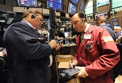 Alcuni operatori finanziari al New York Stock Exchange. 