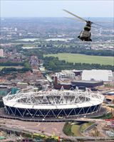 Lo stadio olimpico di Londra sorvolato da un elicottero della Royal Air Force (foto Ansa).