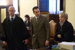 Paoo Gabriele, al centro, durante il processo. A destra il suo avvocato Cristiana Arru. In copertina Paolo Gabriele quando era a servizio del Papa (foto Ansa)