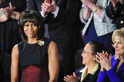 Michelle Obama mentre si prepara ad ascoltare lo "State of the Union" del marito (Ansa).