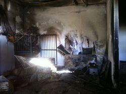La pizzeria della famiglia Impastato a Cinisi, in provincia di Palermo, distrutta da un incendio.