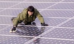Un esempio di energia sostenibile: pannelli solari  a Taiwan. Tutte le foto del servizio sono dell'agenzia Reuters., Reuters