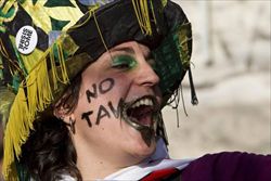 Manifestante No Tav in corteo a Roma, il 3 marzo 2012. Foto Ansa.