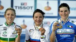 Elisa Longo Borghini (prima a destra), medaglia di bronzo nella prova su strada donne elite ai Mondiali di ciclismo di Limburg, vinta dall'olandese Marianne Vos, oro olimpico a Londra e grande favorita della corsa. Foto Ansa. 